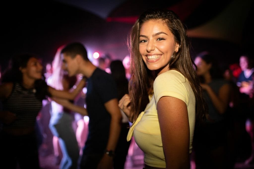 woman standing near group of people 1449791